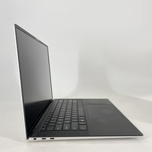 Load image into Gallery viewer, Dell XPS 15 9530 Silver 2.4 GHz Intel Core i7 13th Gen. 32GB RAM 512GB Solid State Drive Intel Arc A370M 4 GB