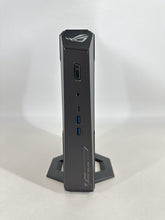 Load image into Gallery viewer, Asus ROG NUC (2025) NUC15JNK Black Intel Core Ultra 9 Series 2 32GB RAM 2TB Solid State Drive NVIDIA GeForce RTX 5070 Ti 12 GB
