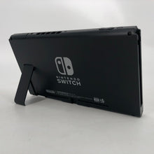 Load image into Gallery viewer, Nintendo Switch Black 32GB w/ Power Cord + Grips + Game